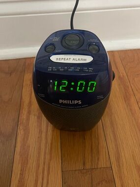 vintage 2000s Philips AJ3130 clock radio in blue with a green LED display